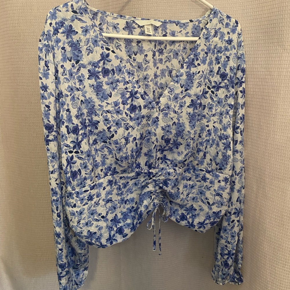 Blue and white floral blouse